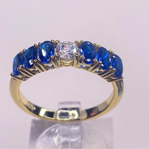 Jewelry - SOLD. STERLING SILVER /14K GOLD &  BLUE SAPPHIRE STONES W/ CENTER SIMULATED.
